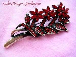 red brooch pin